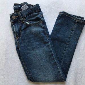 Medium wash blue jeans.